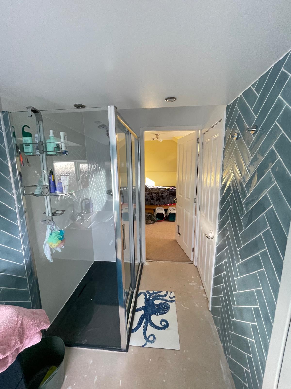 Turquoise herringbone wall tiling by Mark & Patryk