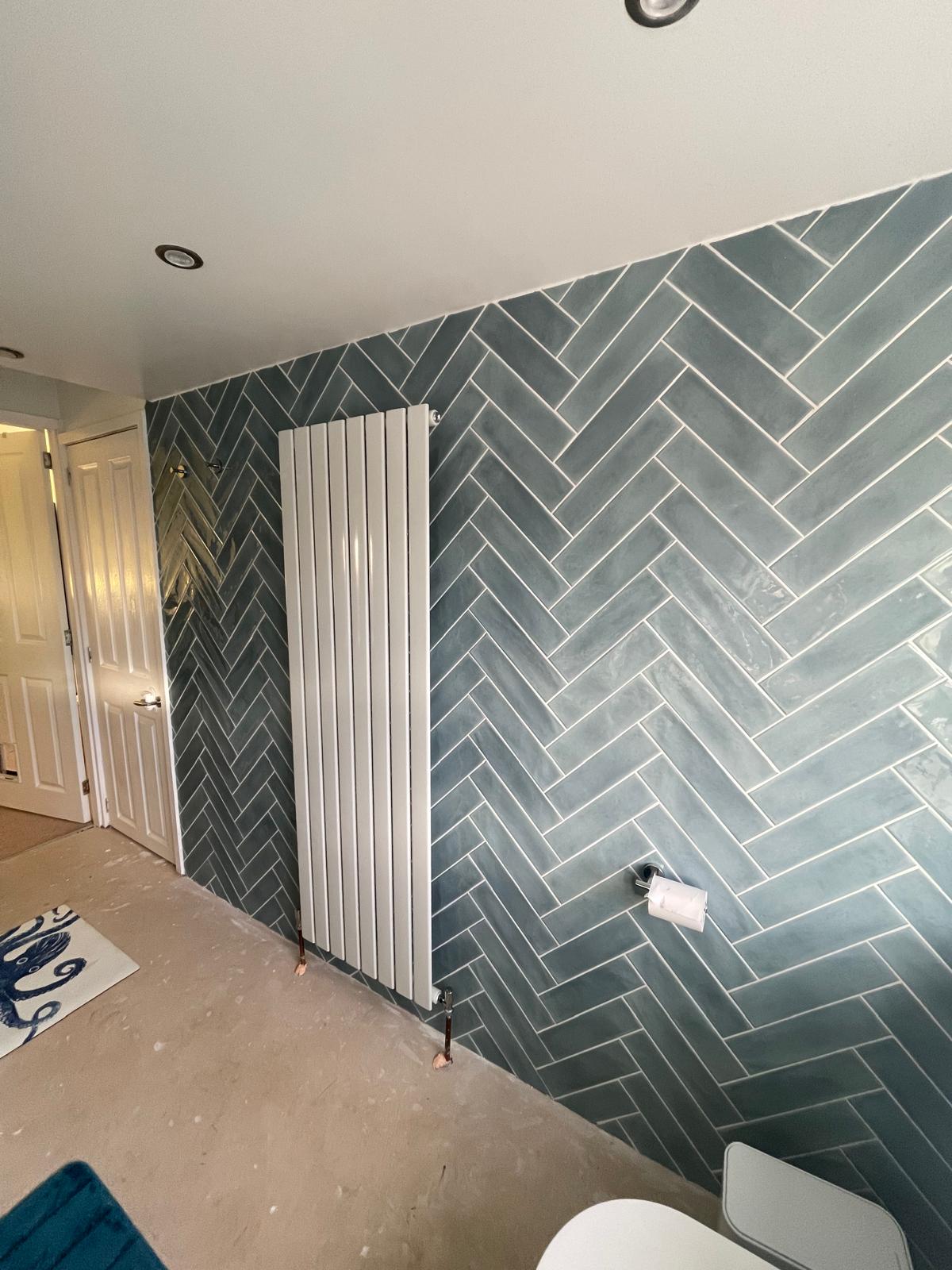 Turquoise herringbone by Mark & Patryk Property Maintenance
